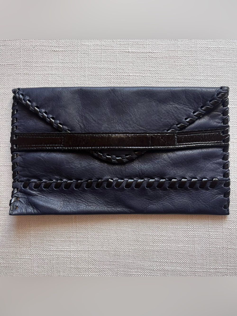 Laggo Navy and Black leather clutch